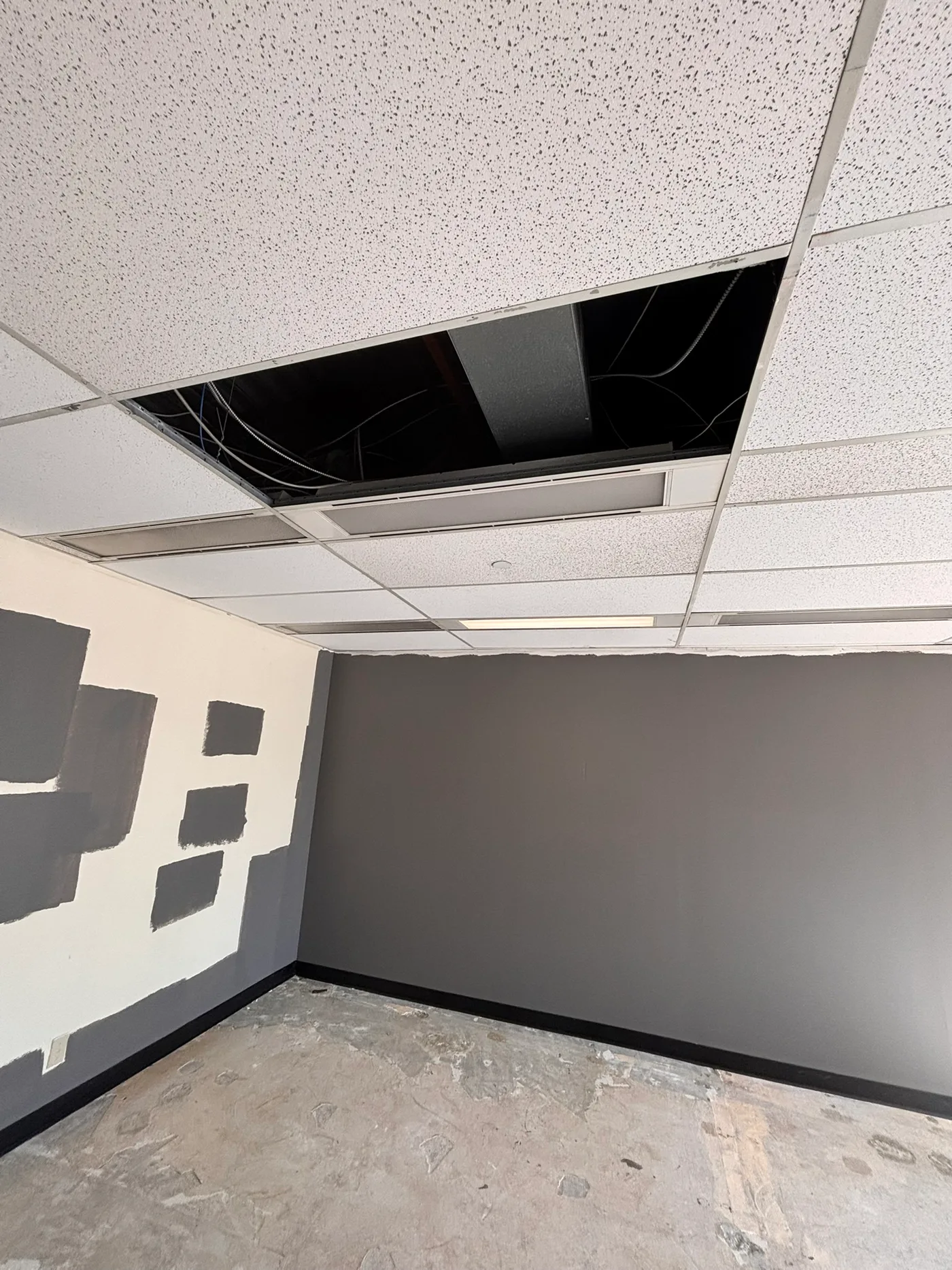 Charcoal accent walls taking shape in treatment rooms